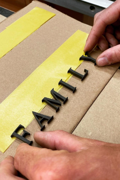 Learn how to glue up and center words or images on wood signs easily, leaving your text perfectly centered on your background.